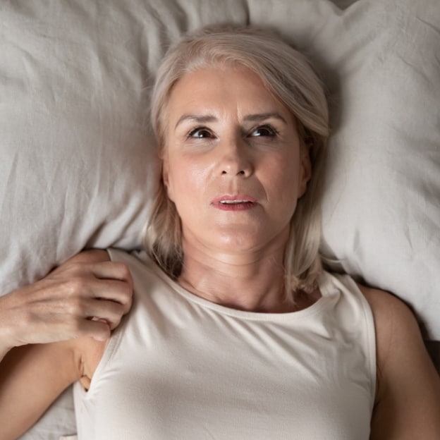 Middle aged mature woman looking worried